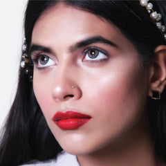 a close up of a person wearing a hat