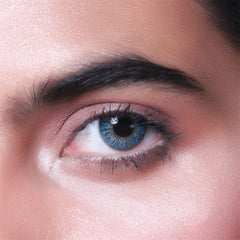 a close up of a mans face with a toothbrush