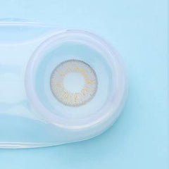 a close up of a cup of water sitting on a table