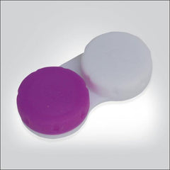 a pink cup sitting on a white surface