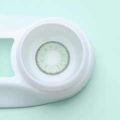 a white frisbee sitting on top of a white table