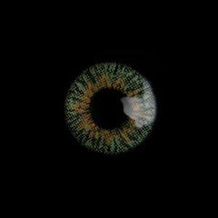 a close up of an apple in a dark room