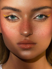 a close up of a woman holding a toothbrush