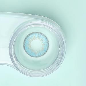 a close up of a toothbrush in a glass cup