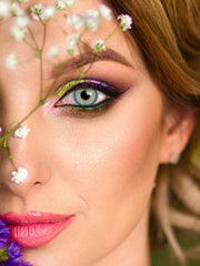 a close up of a child with a toothbrush in her mouth